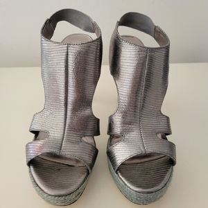 Silver Nine West heels.  Size 5 1/2.